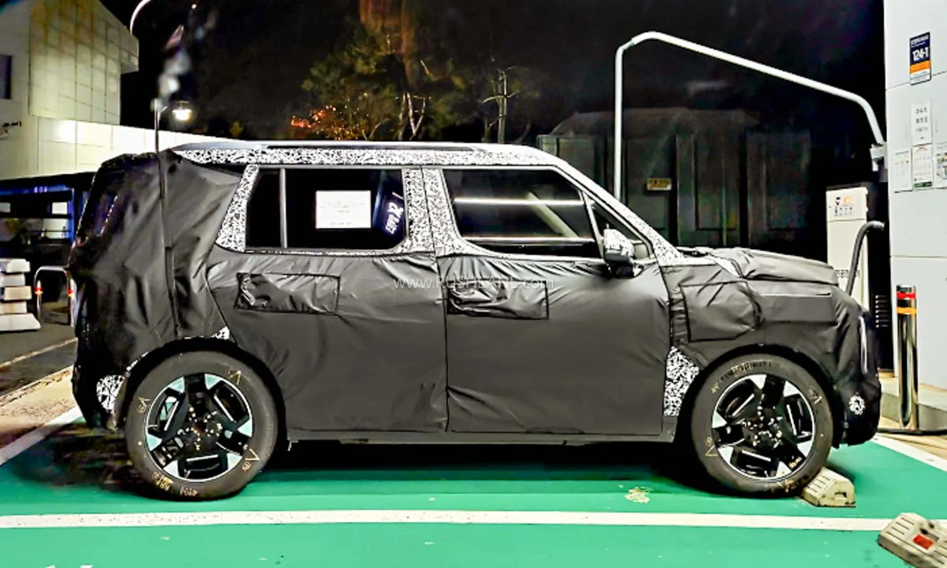 Kia Syros EV Spied at Charging Station