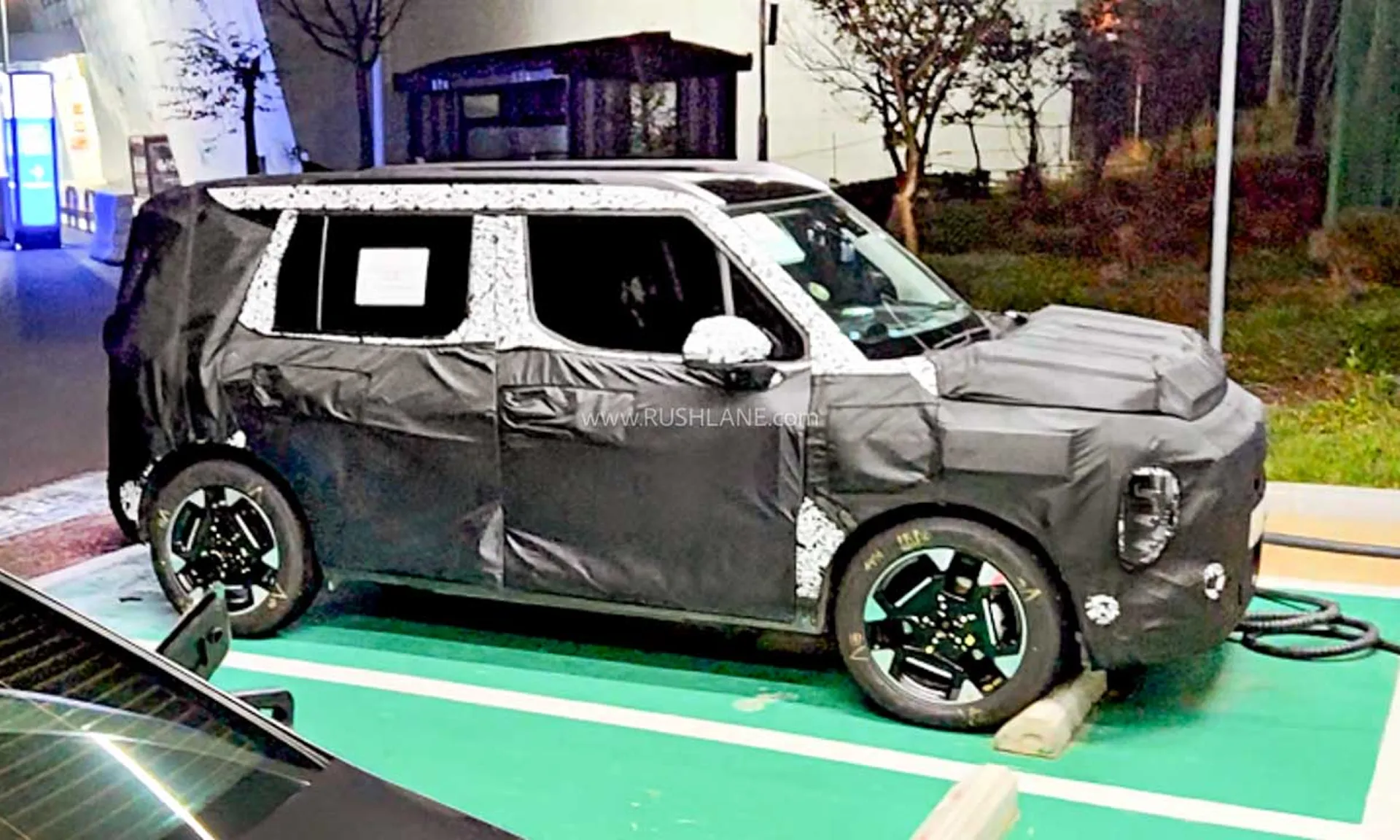 Kia Syros EV Spied at Charging Station