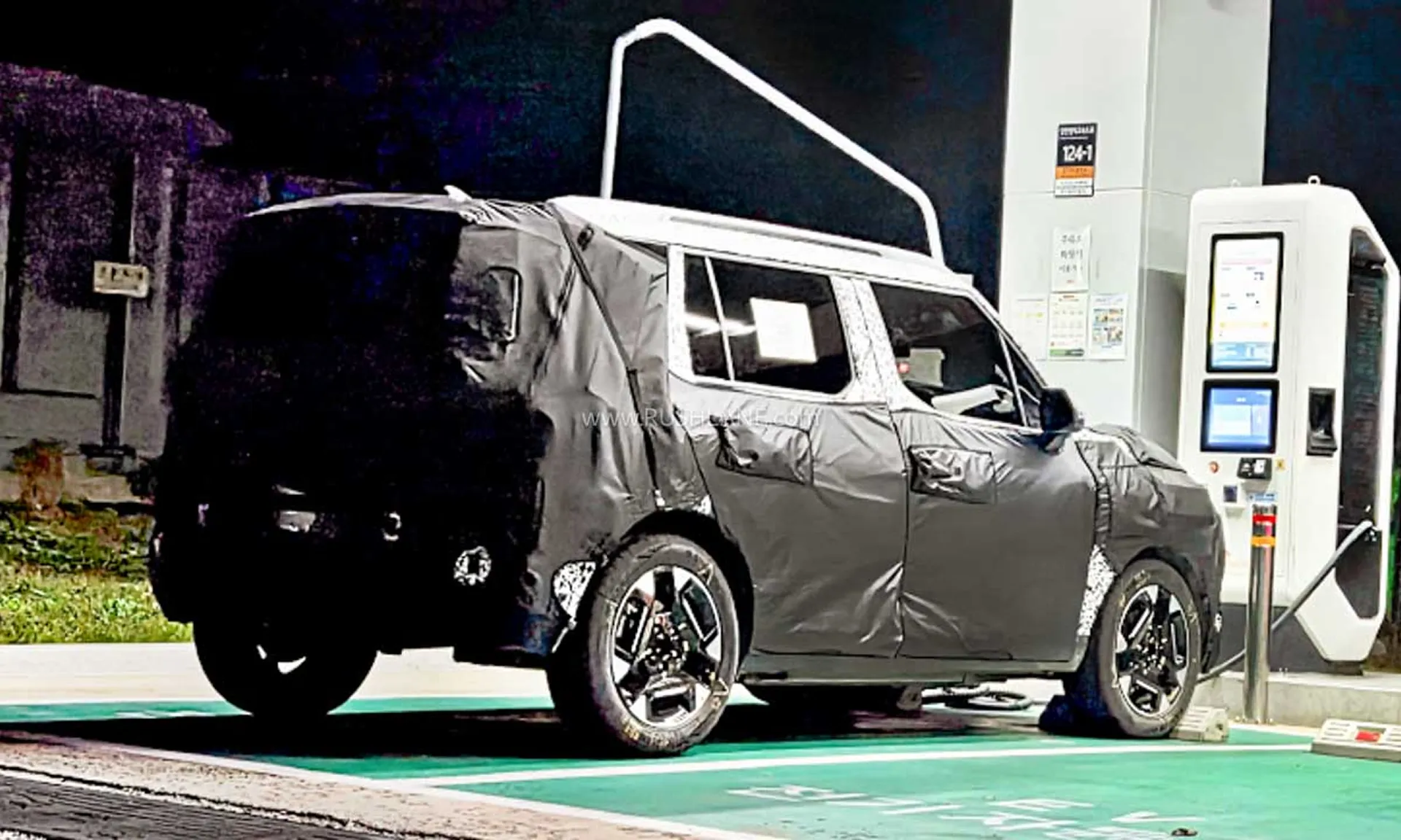 Kia Syros EV Spied at Charging Station