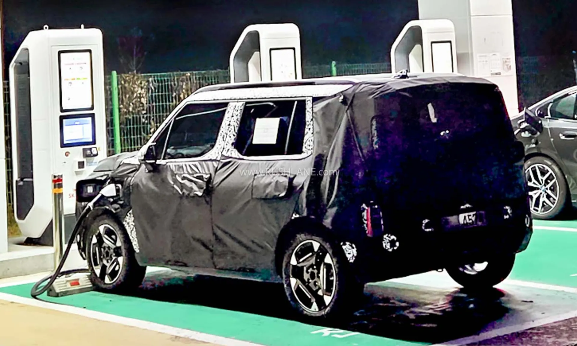 Kia Syros EV Spied at Charging Station