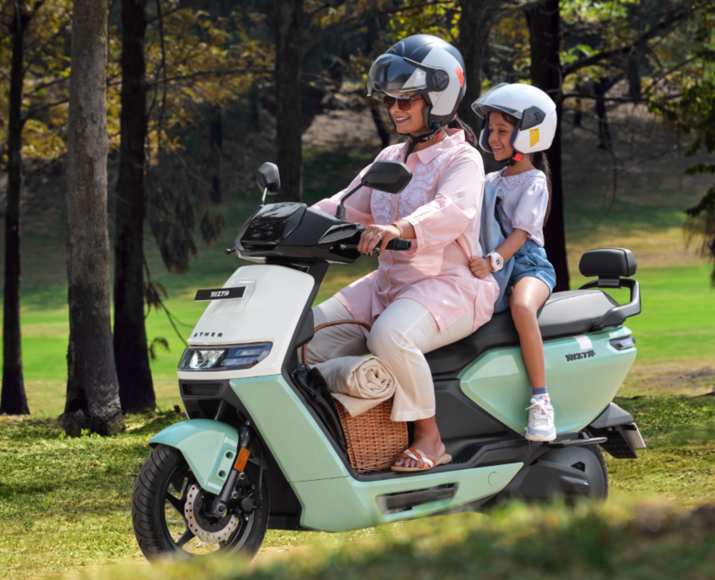 mother and son riding ather rizta
